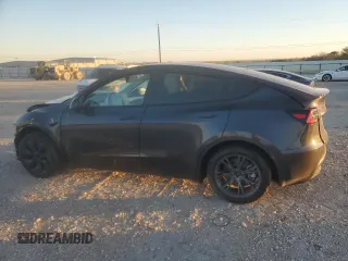 2024 Tesla Model Y с VIN 7SAYGDED4RA324326, выставлен на аукционе Copart как лот 86965534 с пробегом Не указан миль и Списание • Salvage title. История ставок и продаж доступна на DreamBid. Изображение 2.
