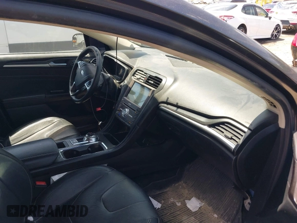 2017 Ford Fusion Titanium с VIN 3FA6P0K99HR136596, выставлен на аукционе IAAI как лот 42347238 с пробегом 149 749 миль миль и . История ставок и продаж доступна на DreamBid. Изображение 5.