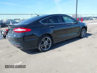 2016 Ford Fusion Titanium with VIN 3FA6P0K9XGR250007, listed as a IAAI auction lot 41775696 with 90,000 mi miles and . Bid and sale history available at DreamBid. Image 4.