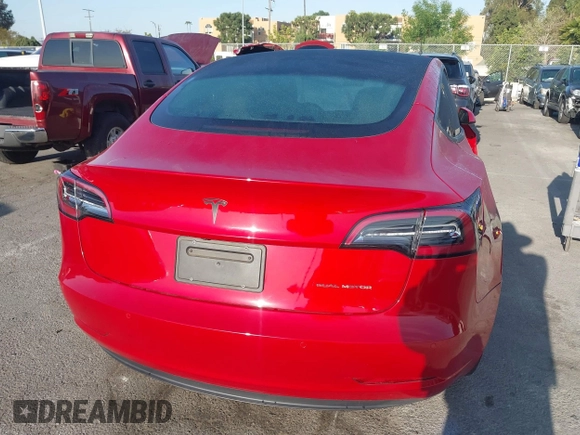 2021 Tesla Model 3 Long Range with VIN 5YJ3E1EB1MF071634, listed as a IAAI auction lot 41964321 with 39,596 mi miles. Bid and sale history available at carsss.com. Image 16.