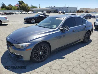 2014 BMW 3 Series 328i with VIN WBA3C1C52EK110185, listed as a Copart auction lot 63868945 with 149,633 mi miles and Salvage title. Bid and sale history available at DreamBid. Image 1.
