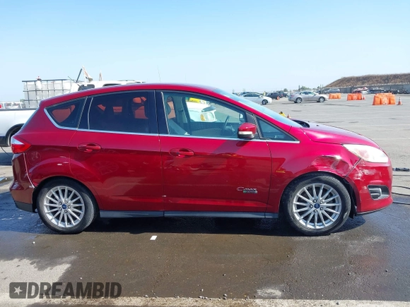 2013 Ford C-Max SEL z VIN 1FADP5CU4DL555035, wystawiony jako IAAI lot #42355498 z przebiegiem 172 374 mil mil oraz . Historia ofert i sprzedaży dostępna na DreamBid. Obrazek 13.