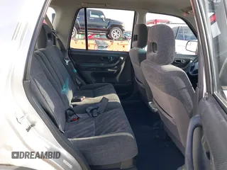 2000 Honda CR-V LX with VIN JHLRD184XYC054038, listed as a IAAI auction lot 41414445 with 294,210 mi miles. Bid and sale history available at carsss.com. Image 8.