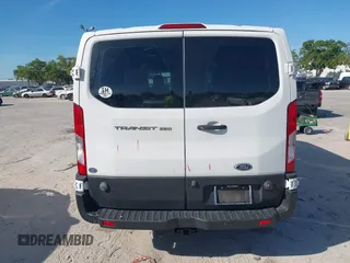 2019 Ford Transit z VIN 1FTYR2ZM1KKB25574, wystawiony jako IAAI lot #41891247 z przebiegiem 142 627 mil mil oraz . Historia ofert i sprzedaży dostępna na DreamBid. Obrazek 16.