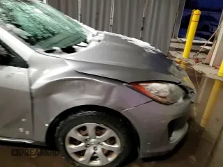 2012 Mazda 3 i Sport with VIN JM1BL1UG6C1510686, listed as a Copart auction lot 88767135 with 123,284 mi miles and Salvage Title. Bid and sale history available at DreamBid. Image 13.