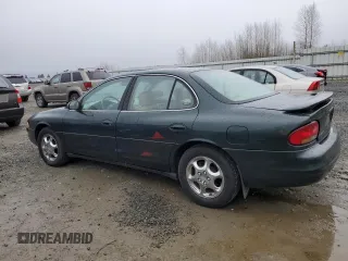 1998 Oldsmobile Intrigue GL z VIN 1G3WS52K5WF378188, wystawiony jako Copart lot #48307915 z przebiegiem 96 918 mil mil oraz Szkoda całkowita • Salvage title. Historia ofert i sprzedaży dostępna na DreamBid. Obrazek 2.
