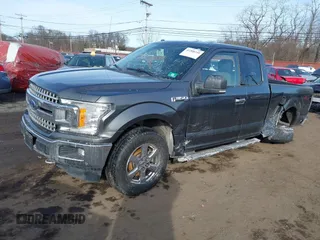 2018 Ford F-150 XL with VIN 1FTEX1EP7JFA75693, listed as a IAAI auction lot 41308249 with 75,747 mi miles and . Bid and sale history available at DreamBid. Image 19.