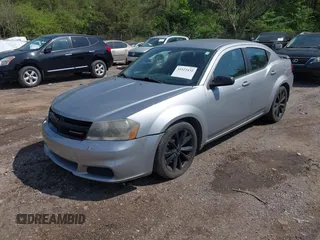 2014 Dodge Avenger SE with VIN 1C3CDZAB0EN133684, listed as a IAAI auction lot 41923432 with 158,771 mi miles and . Bid and sale history available at DreamBid. Image 2.