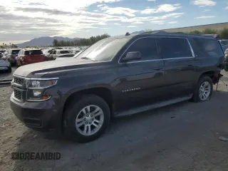 2015 Chevrolet Suburban LT with VIN 1GNSKJKC7FR192724, listed as a Copart auction lot 54792875 with 190,210 mi miles and Salvage title. Bid and sale history available at DreamBid. Image 1.
