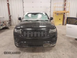 2015 Jeep Grand Cherokee Laredo with VIN 1C4RJFAG3FC607827, listed as a IAAI auction lot 41298397 with 198,171 mi miles. Bid and sale history available at carsss.com. Image 6.