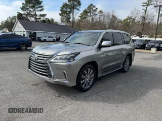 2016 Lexus LX 570 with VIN JTJHY7AX1G4191444, listed as a Copart auction lot 50238115 with 121,532 mi miles and Clean Title. Bid and sale history available at DreamBid. Image 1.