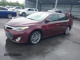 2014 Toyota Avalon Limited with VIN 4T1BK1EB3EU113035, listed as a IAAI auction lot 42040239 with 118,609 mi miles. Bid and sale history available at carsss.com. Image 2.