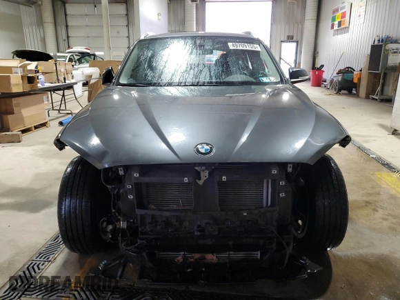 2015 BMW X1 xDrive28i with VIN WBAVL1C50FVY26284, listed as a Copart auction lot 49709155 with 120,138 mi miles and Salvage Title. Bid and sale history available at carsss.com. Image 5.