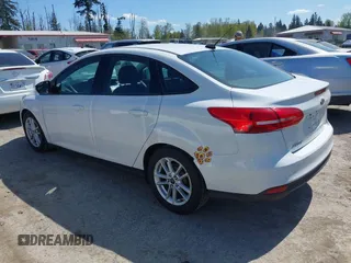 2016 Ford Focus SE with VIN 1FADP3F22GL272491, listed as a IAAI auction lot 42042160 with 140,355 mi miles. Bid and sale history available at carsss.com. Image 3.