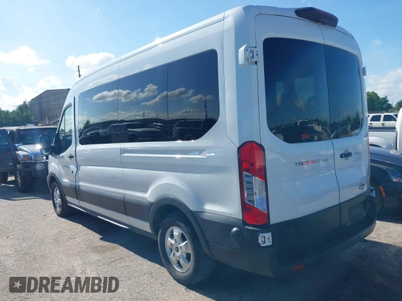 2019 Ford Transit Passenger XL with VIN 1FBAX2CMXKKA94605, listed as a IAAI auction lot 42608464 with 134,305 mi miles and . Bid and sale history available at DreamBid. Image 3.