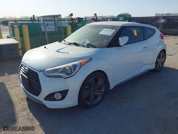 2015 Hyundai Veloster Turbo with VIN KMHTC6AE5FU228008, listed as a IAAI auction lot 42016707 with 122,507 mi miles. Bid and sale history available at carsss.com. Image 6.