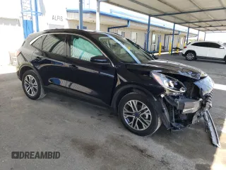 2021 Ford Escape SEL with VIN 1FMCU9H65MUA70490, listed as a Copart auction lot 57815275 with 62,227 mi miles and Salvage title. Bid and sale history available at DreamBid. Image 4.