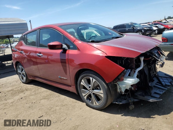 2018 Nissan LEAF S with VIN 1N4AZ1CP2JC303571, listed as a Copart auction lot 55249995 with 33,009 mi miles and Salvage Title. Bid and sale history available at DreamBid. Image 4.