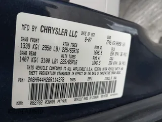 2008 Chrysler Town & Country LX with VIN 2A8HR44H28R114978, listed as a IAAI auction lot 41860775 with 179,828 mi miles. Bid and sale history available at carsss.com. Image 9.