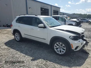 2013 BMW X5 xDrive35i z VIN 5UXZV4C52D0G56473, wystawiony jako Copart lot #56563345 z przebiegiem 156 884 mil mil oraz Szkoda całkowita • Salvage title. Historia ofert i sprzedaży dostępna na DreamBid. Obrazek 4.