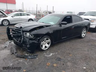 2014 Dodge Charger Police with VIN 2C3CDXAT0EH241700, listed as a IAAI auction lot 41441494 with 148,642 mi miles. Bid and sale history available at carsss.com. Image 2.