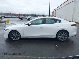 2020 Mazda 3 Premium with VIN 3MZBPBEMXLM133357, listed as a IAAI auction lot 41540234 with 81,280 mi miles and . Bid and sale history available at DreamBid. Image 15.