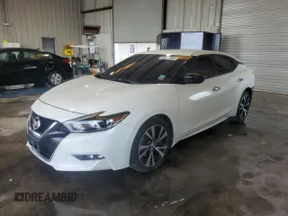2018 Nissan Maxima SL with VIN 1N4AA6AP5JC409519, listed as a Copart auction lot 58919465 with 73,997 mi miles and Salvage title. Bid and sale history available at DreamBid. Image 1.