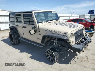 2016 Jeep Wrangler Unlimited Rubicon z VIN 1C4HJWFGXGL236560, wystawiony jako Copart lot #57528355 z przebiegiem 64 634 mil mil oraz Szkoda całkowita • Salvage title. Historia ofert i sprzedaży dostępna na DreamBid. Obrazek 4.