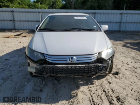 2010 Honda Insight EX z VIN JHMZE2H77AS035113, wystawiony jako Copart lot #54179005 z przebiegiem 165 083 mil mil oraz Szkoda całkowita • Salvage title. Historia ofert i sprzedaży dostępna na DreamBid. Obrazek 5.