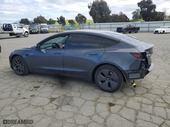 2023 Tesla Model 3 with VIN 5YJ3E1EA2PF432638, listed as a Copart auction lot 50543235 with 24,047 mi miles and Salvage Title. Bid and sale history available at carsss.com. Image 2.