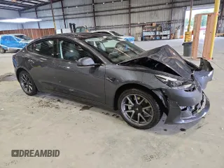 2023 Tesla Model 3 with VIN 5YJ3E1EA4PF554840, listed as a Copart auction lot 63731175 with Not provided miles and Salvage title. Bid and sale history available at DreamBid. Image 4.