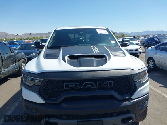 2022 Ram 1500 TRX with VIN 1C6SRFU95NN245954, listed as a IAAI auction lot 42032210 with 30,870 mi miles and . Bid and sale history available at DreamBid. Image 6.