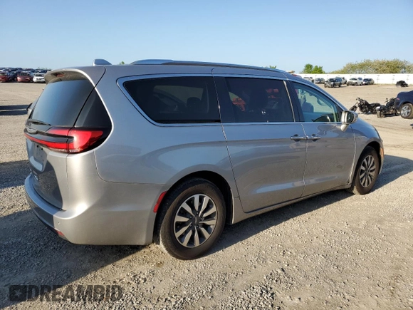 2021 Chrysler Pacifica Touring L z VIN 2C4RC1BG7MR531481, wystawiony jako Copart lot #54854105 z przebiegiem 138 508 mil mil oraz Szkoda całkowita • Salvage title. Historia ofert i sprzedaży dostępna na DreamBid. Obrazek 3.