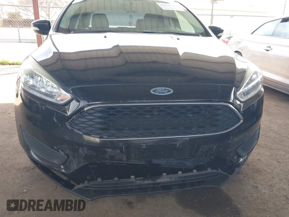 2015 Ford Focus SE with VIN 1FADP3F25FL330463, listed as a IAAI auction lot 41755867 with 72,725 mi miles. Bid and sale history available at carsss.com. Image 6.