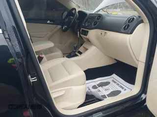2012 Volkswagen Tiguan SE with VIN WVGAV7AX0CW602713, listed as a IAAI auction lot 41558520 with 95,678 mi miles and . Bid and sale history available at DreamBid. Image 5.