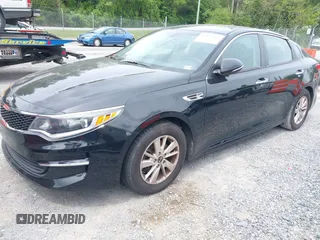 2018 Kia Optima LX with VIN 5XXGT4L36JG216244, listed as a IAAI auction lot 42223456 with 134,150 mi miles and . Bid and sale history available at carsss.com. Image 2.