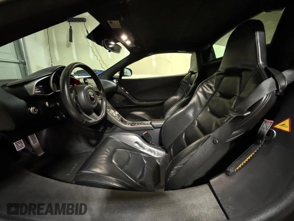2016 McLaren 650S z VIN SBM11FAAXGW005605, wystawiony jako Copart lot #53181285 z przebiegiem 16 800 mil mil oraz Tytuł czysty. Historia ofert i sprzedaży dostępna na DreamBid. Obrazek 5.