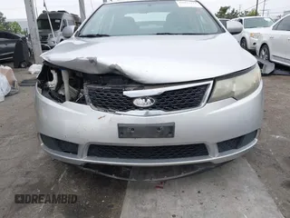 2013 Kia Forte LX with VIN KNAFT4A21D5739585, listed as a IAAI auction lot 42097213 with 195,500 mi miles. Bid and sale history available at carsss.com. Image 6.