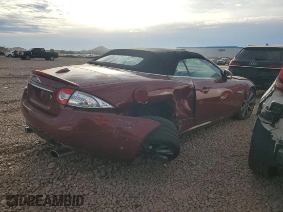 2013 Jaguar XK with VIN SAJWA4GB0DLB50530, listed as a Copart auction lot 82715724 with 24,634 mi miles and Salvage Title. Bid and sale history available at carsss.com. Image 3.