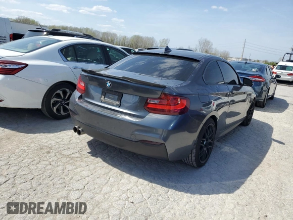 2015 BMW 2 Series 228i with VIN WBA1F5C57FV256779, listed as a Copart auction lot 49162474 with 69,078 mi miles and Salvage Title. Bid and sale history available at carsss.com. Image 3.