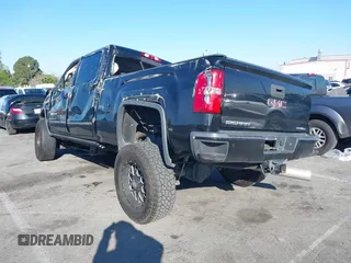 2019 GMC Sierra 2500HD Denali with VIN 1GT12SEYXKF222893, listed as a IAAI auction lot 41722342 with 114,613 mi miles. Bid and sale history available at carsss.com. Image 3.