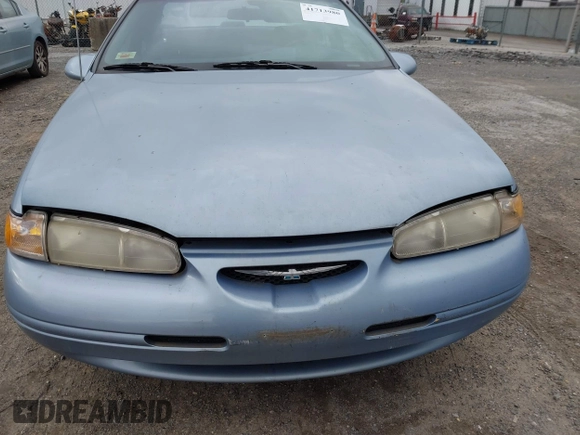 1997 Ford Thunderbird LX z VIN 1FALP62W2VH105702, wystawiony jako IAAI lot #41713980 z przebiegiem 90 775 mil mil oraz . Historia ofert i sprzedaży dostępna na DreamBid. Obrazek 10.