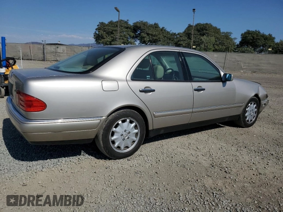 1999 Mercedes-Benz E-Class with VIN WDBJF65H5XA804902, listed as a Copart auction lot 73704634 with 92,411 mi miles and Salvage Title. Bid and sale history available at carsss.com. Image 3.