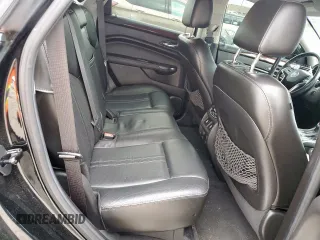 2015 Cadillac SRX Premium Collection z VIN 3GYFNDE33FS574125, wystawiony jako Copart lot #55530575 z przebiegiem 76 956 mil mil oraz Szkoda całkowita • Salvage title. Historia ofert i sprzedaży dostępna na DreamBid. Obrazek 11.