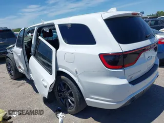 2018 Dodge Durango SRT with VIN 1C4SDJGJ4JC341550, listed as a IAAI auction lot 42147955 with 86,503 mi miles and . Bid and sale history available at DreamBid. Image 3.