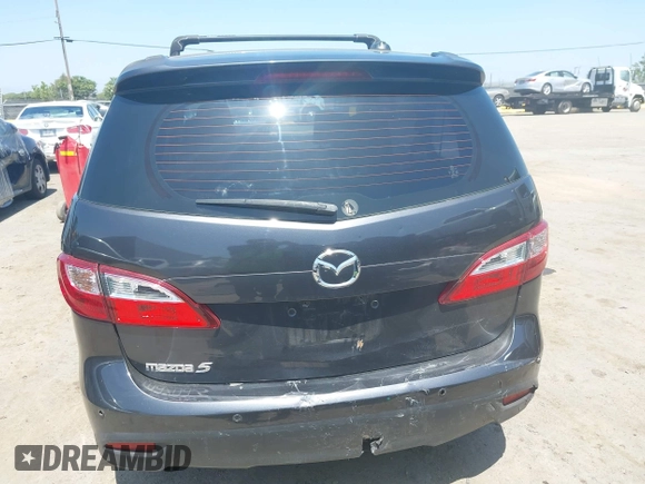 2014 Mazda 5 Grand Touring with VIN JM1CW2DL8E0171095, listed as a IAAI auction lot 41962650 with 85,048 mi miles and . Bid and sale history available at DreamBid. Image 16.