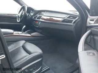 2014 BMW X6 50i with VIN 5UXFG8C57EL593257, listed as a IAAI auction lot 41655486 with 128,292 mi miles. Bid and sale history available at carsss.com. Image 5.