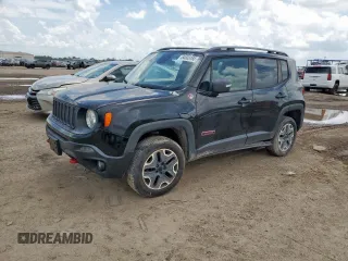2015 Jeep Renegade Trailhawk z VIN ZACCJBCT8FPB83856, wystawiony jako Copart lot #64603165 z przebiegiem 167 162 mil mil oraz Czysty tytuł • Clean title. Historia ofert i sprzedaży dostępna na DreamBid. Obrazek 1.