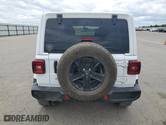 2020 Jeep Wrangler Unlimited Sahara with VIN 1C4HJXEN6LW254035, listed as a Copart auction lot 48900275 with 69,368 mi miles and Salvage Title. Bid and sale history available at carsss.com. Image 6.