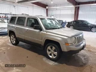 2014 Jeep Patriot Sport with VIN 1C4NJPBB2ED758884, listed as a IAAI auction lot 41290599 with 136,655 mi miles and . Bid and sale history available at DreamBid. Image 1.